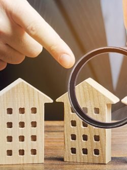 A man chooses an apartment house among many propositions options in the real estate market. Housing solution. Facilities and infrastructure. Investments. Realtor services to find suitable options.